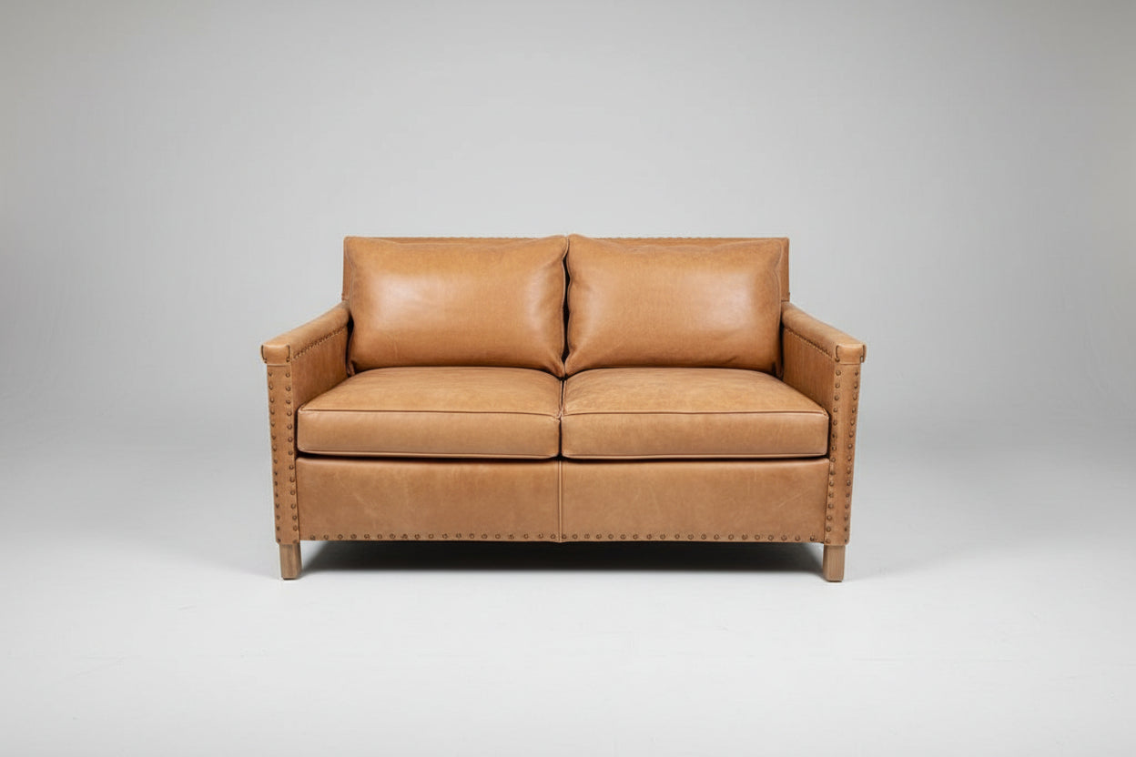 C&B Leather Loveseat 57”W x 34”D x 32”H