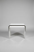Laminate Waterfall Desk with chrome trim.