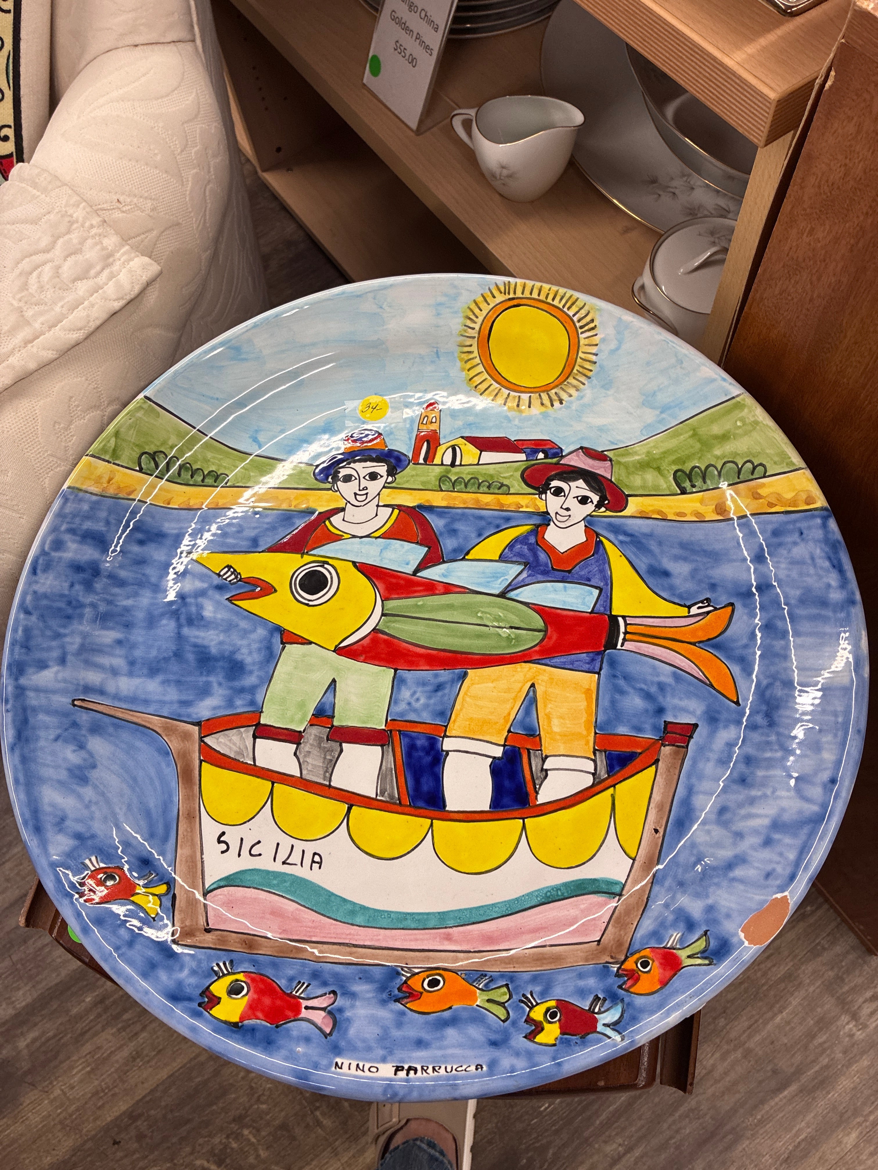 Nino Parrucca hand-painted Sicilian ceramic plate featuring a fishermen scene