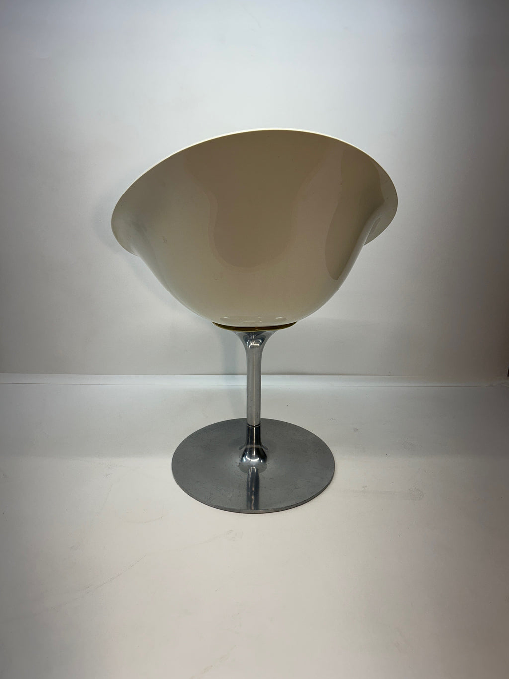 White Eros chair with aluminum swivel base by Philippe Starck for Kartell. Made in Italy.