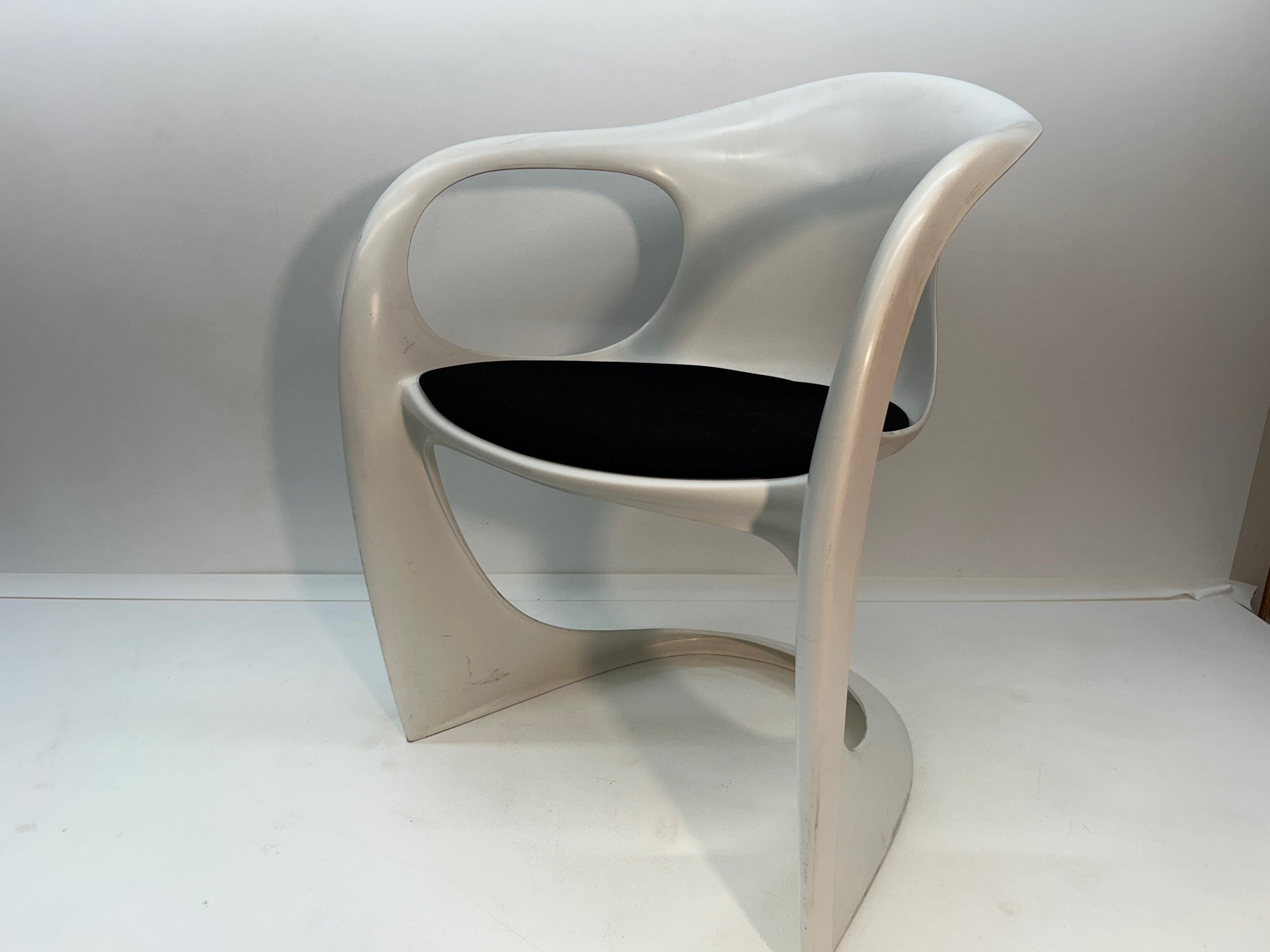 White Casalino armchairs by Casala with Black Seat Covers