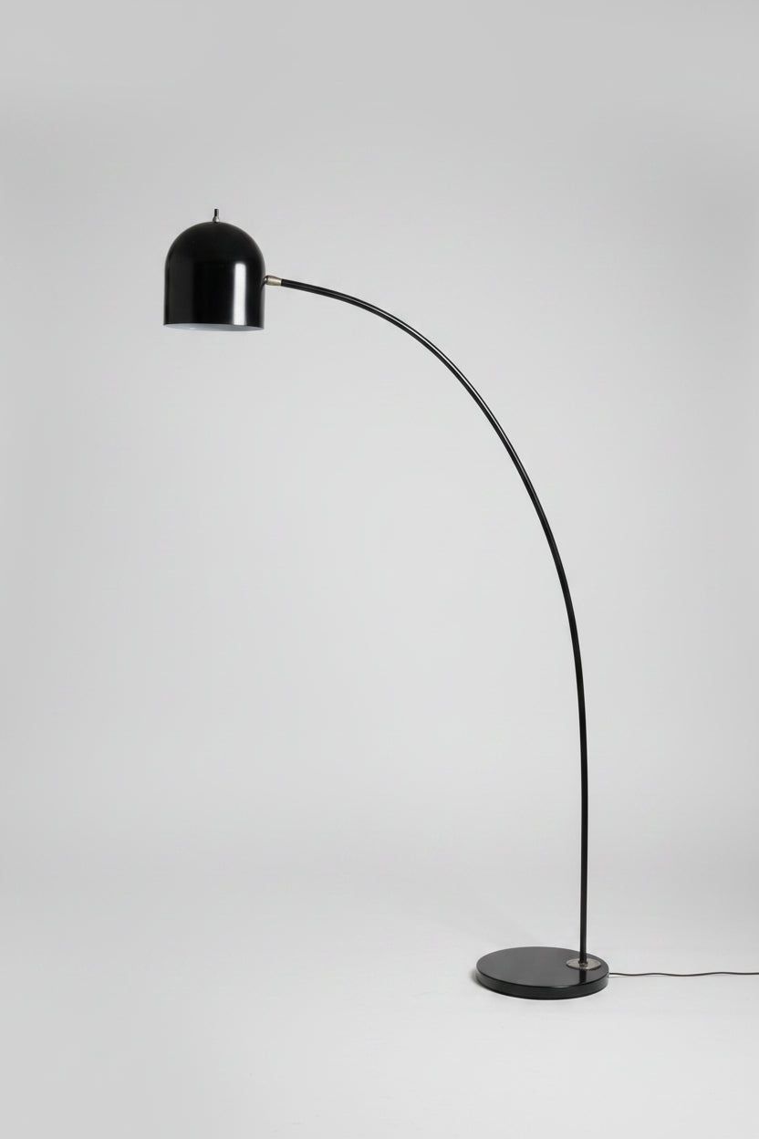 Mid-Century Modern style black metal arc floor lamp.