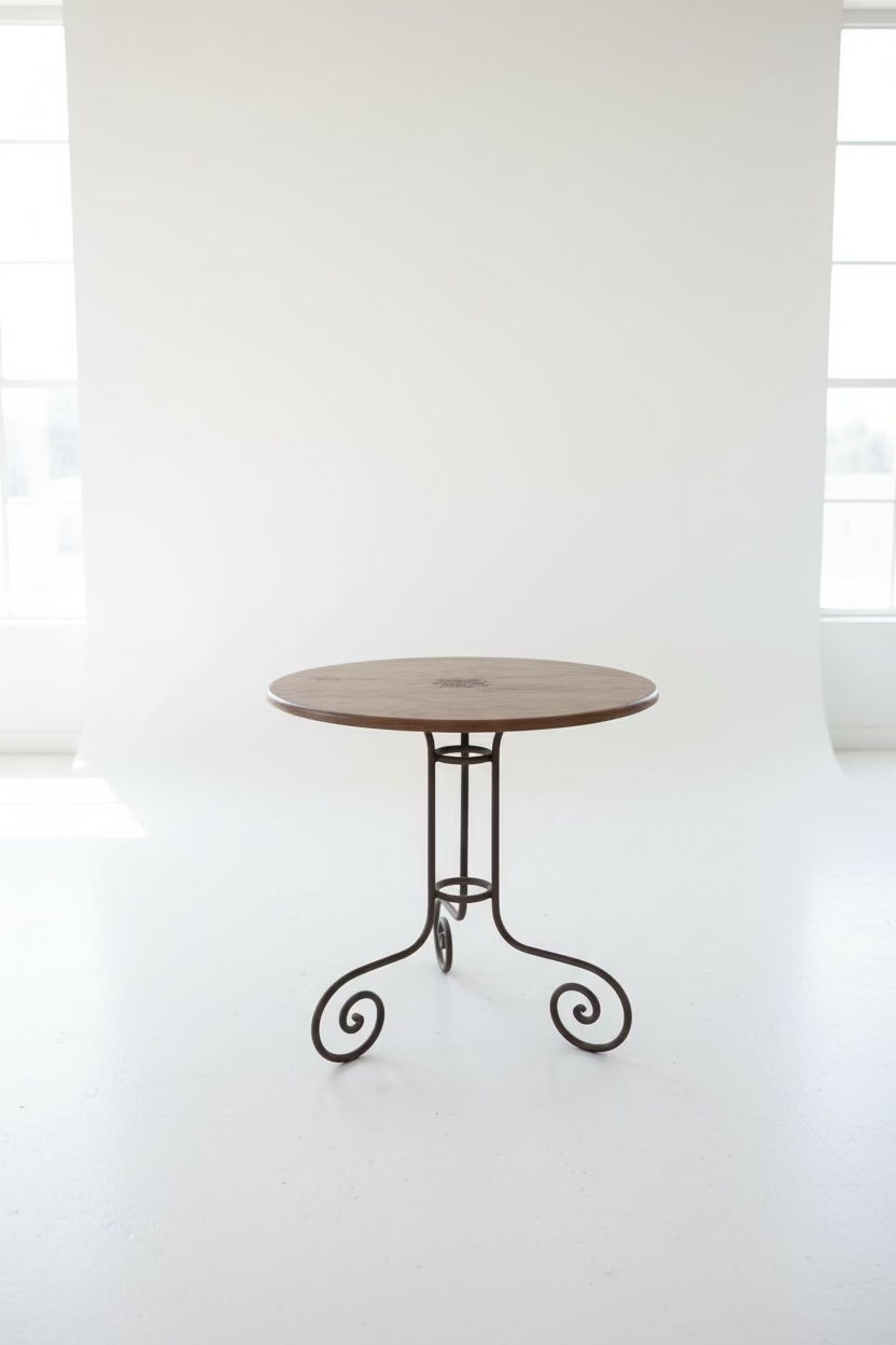 Tooled Leather and Iron Base Bistro Table