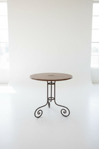 Tooled Leather and Iron Base Bistro Table