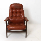 STYLE OF EKORNES LEATHER LOUNGE CHAIR C. 1970S