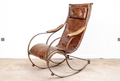 R.W. WINFIELD & CO. 19TH C. IRON AND LEATHER ROCKING CHAIR