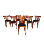 Bistro Chairs in Cherry with upholstered blue seats.